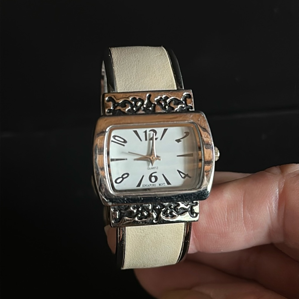 Watch - cream colored hinged cuff metal faux leather band. Working, new battery